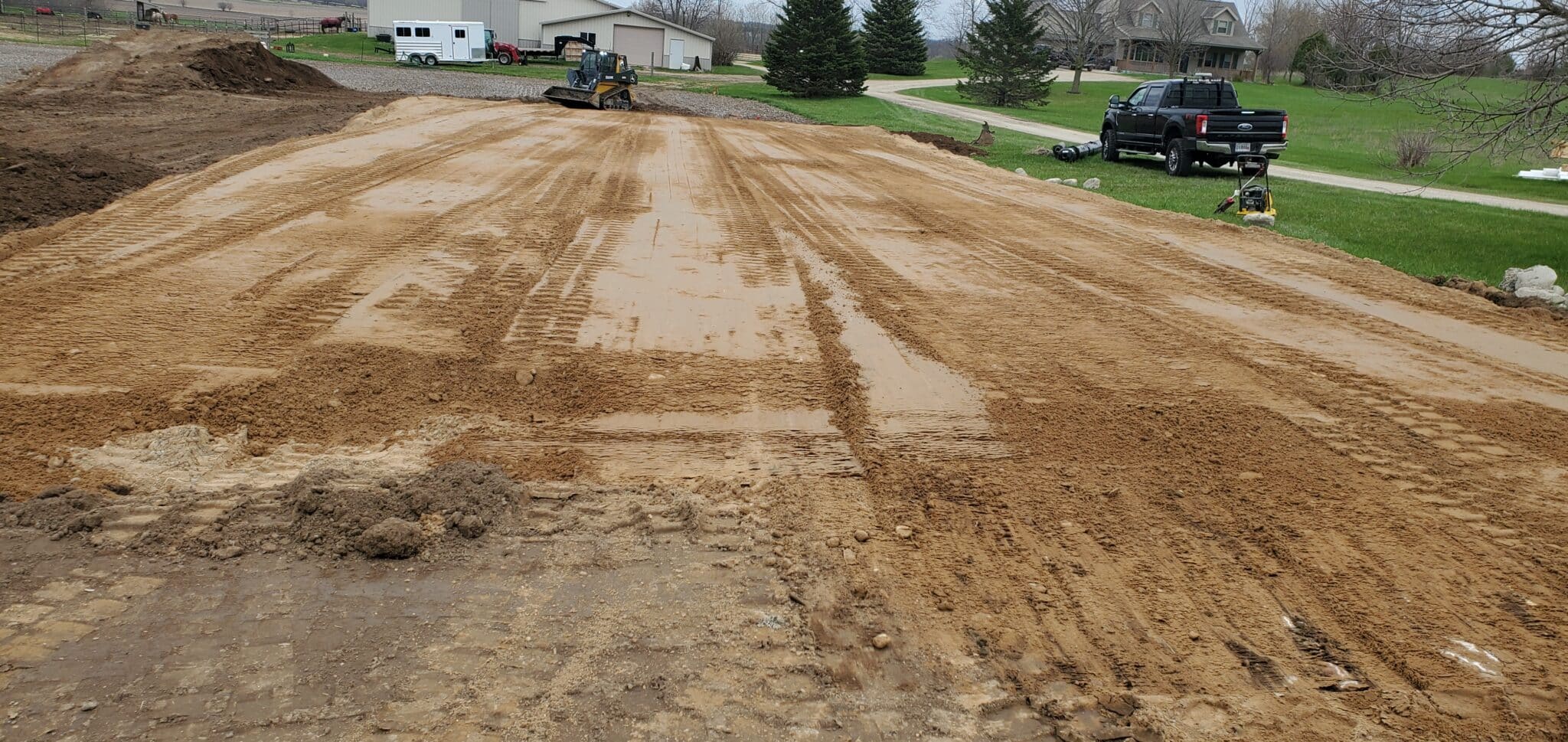 Site Preparation A large-scale land development site in Wisconsin being professionally graded and leveled for new residential or commercial infrastructure.